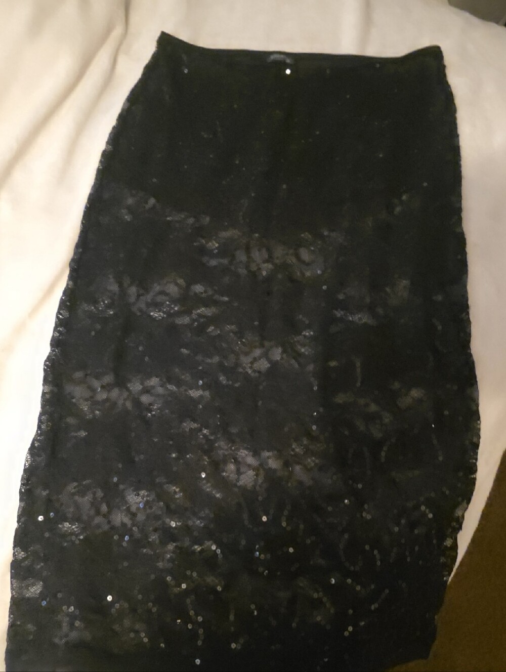 10 clothing items in good condition (some new): skirt, shorts, shirt, dress, and